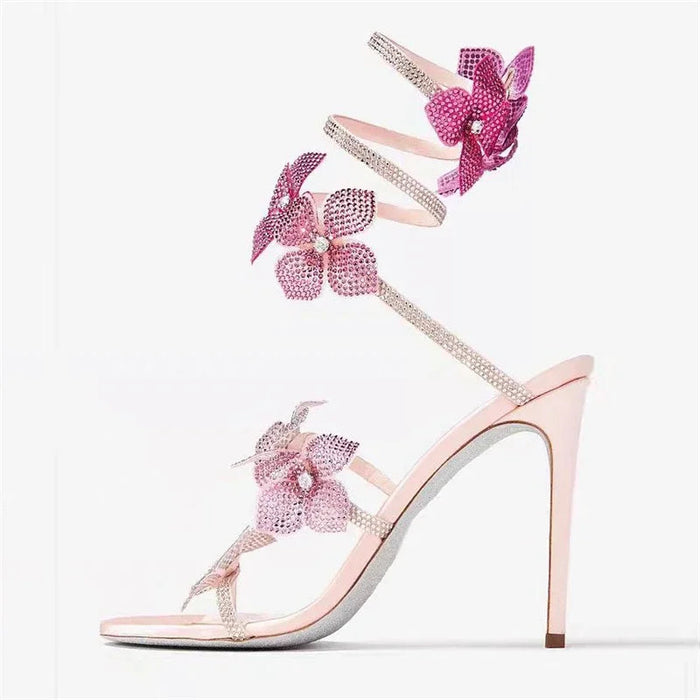 Babyroze sandalen met bloemen, wikkelbandjes en stilettohak