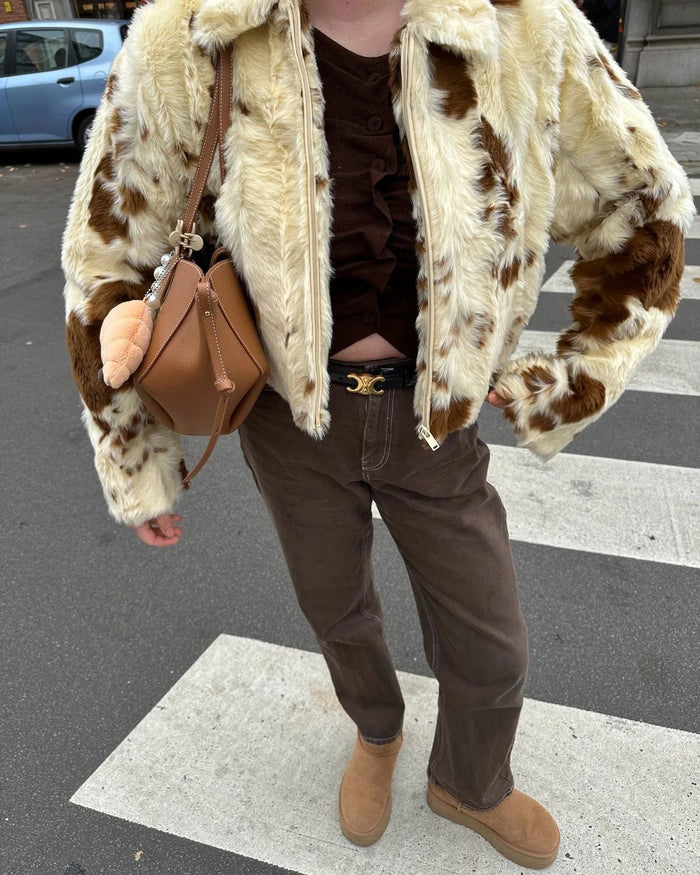 Zachte imitatiebontjas met koeienprint