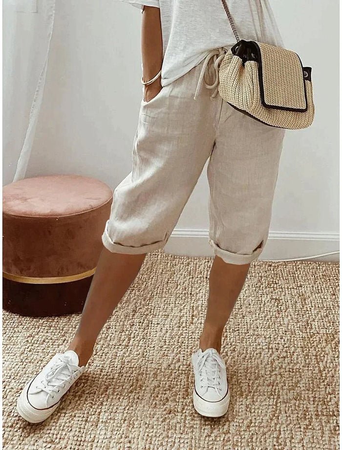 Capribroek met elastische taille en zakken