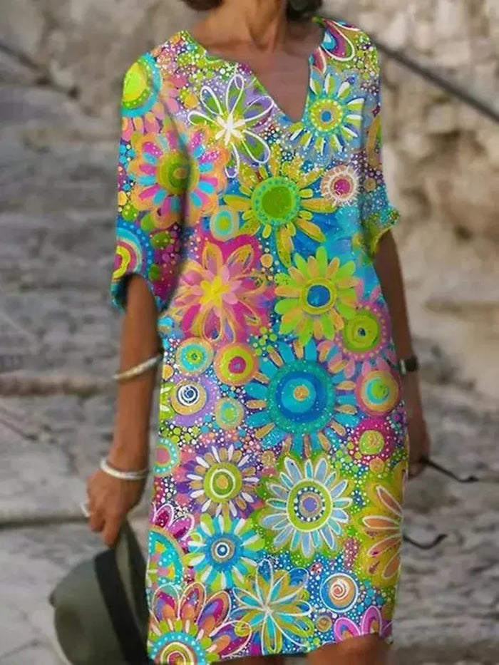 Dames zomerjurk met bloemenprint en V-hals, van ademende stof