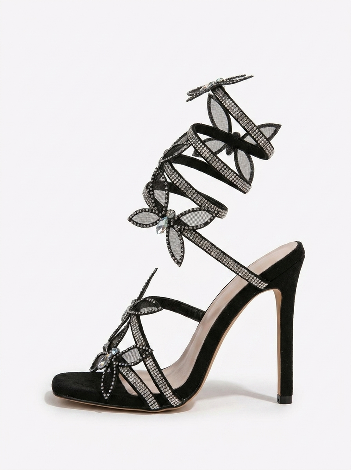 Stiletto sandalen met gewikkelde bandjes en bloemendetail
