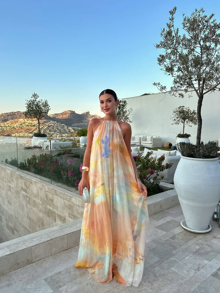 Oranje maxi-jurk met print, halterhals en open rug