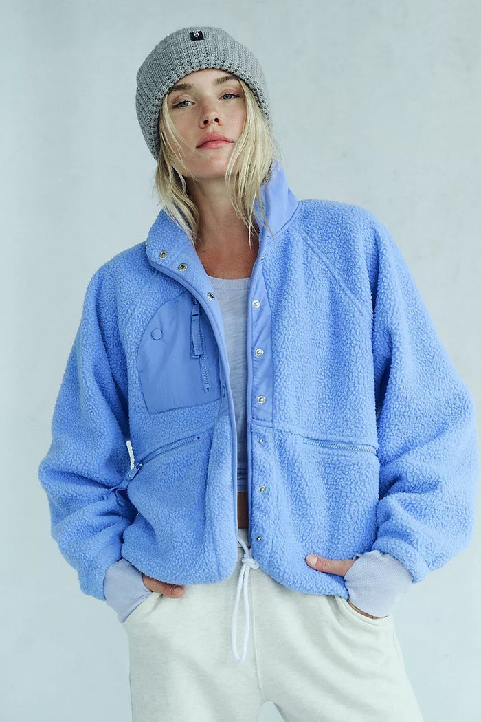 Teddyjas van sherpafleece met contrastbies